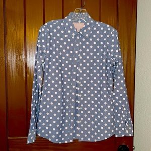 Can be worn buttoned or open with camisole. Cuffs can be turned up